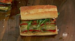 How to Make Jeff’s Ratatouille Sandwich | Jeff Mauro makes his version of ratatouille (in a loaf pan!) and turns it into a SANDWICH! 🤯🤯 

Watch #TheKitchen > Saturdays at 11a|10c and subscribe to… | By Food Network | Facebook