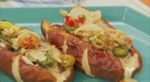 How to Make Jeff Mauro’s Third Down Conversion Dogs | And the crowd goes willlld for Jeff Mauro’s stadium-worthy charred hot dogs, topped with homemade beer cheese, and served on pretzel buns 👏🌭👏 

Watch… | By Food Network | Facebook