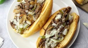 This Best Philly Cheesesteak recipe is made with ribeye steak, bell peppers, onions, and mushrooms. Cover… | Philly cheese steak, Cheesesteak, Cheese steak sandwich