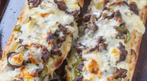 Philly Cheesesteak Cheesy Bread is cheesy and crunchy and full of delicious cheese steak flavors including ribey… | Easy steak recipes, Recipes, Cheesy bread recipe