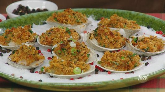 How to Make GZ’s Stuffed Clams Oreganata with Harissa | The trick for keeping these Stuffed Clams Oreganata warm… serve them on a warmed plate with a bed of salt! 

Watch Geoffrey Zakarian on #TheKitchen,… | By Food Network | Facebook