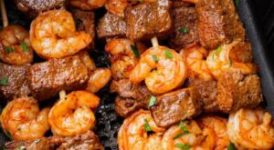 Steak and Shrimp kabobs in air fryer basket sprinkle with fresh cilantro. | Air fryer recipes healthy, Air fryer dinner recipes, Air fyer recipes