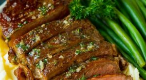 Sirloin steak seared to perfection and topped with garlic and herb butter. #steak #dinneratthezoo | Grilled steak recipes, Top sirloin steak recipe, Steak dinner