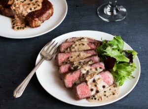 Andrew Zimmern Cooks Steak Au Poivre | Inspired by the classic French bistro dish, this steak au poivre with a peppercorn-laden creamy integral pan sauce is an easy yet elegant way to impress… | By Andrew Zimmern | Facebook