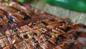 Marinated flank steak is grilled to perfection for the best Authentic Carne Asada. This tender, … | Marinated flank steak, Carne asada, Authentic carne asada recipe