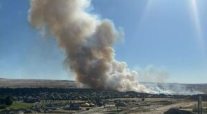 Fire crews swarm south Kennewick fire. Red flag warning issued for windy, hot Saturday