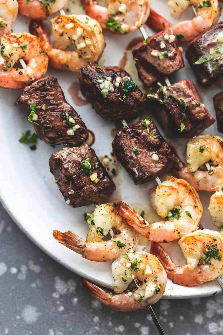 Garlic Butter Surf and Turf Kabobs easy grilled beef steak and shrimp kabob recipe | lecremedelacrumb.com | Steak and shrimp, Beef recipes, Kabob recipes