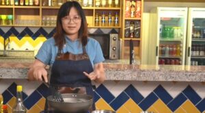 Guilin woman teaches Brazilians how to cook Chinese food