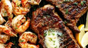 Grilled Steak & Shrimp slathered in garlic butter makes for the BEST steak recipe! A gourmet steak di… | Good steak recipes, Steak and shrimp, Grilled steak recipes