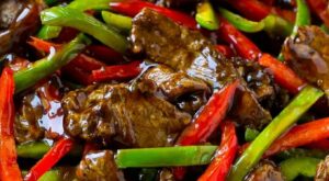 Pepper steak stir fry with thinly sliced steak and red and green bell peppers in a savory sauce. | Pepper steak, Stir fry dinners, Steak dishes