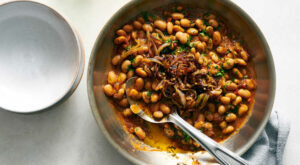 Rosemary White Beans With Frizzled Onions and Tomato Recipe – The New York Times