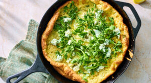 A Savory Goat Cheese and Dill Dutch Baby Drizzled With Honey and Lemon