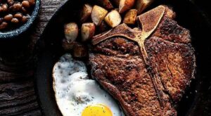 Farm to table. Grilled 32oz T-Bone Steak and Fried Eggs with baked beans crispy red skin potatoes and a massive mug of dark… | Food, Photographing food, Baked beans