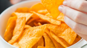 High-Sodium Snack Foods No One Should Be Eating Anymore Because They Cause Bloating & Acid Reflux