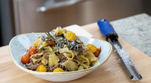 Braised lamb shank pappardelle pasta with blistered rosemary tomatoes