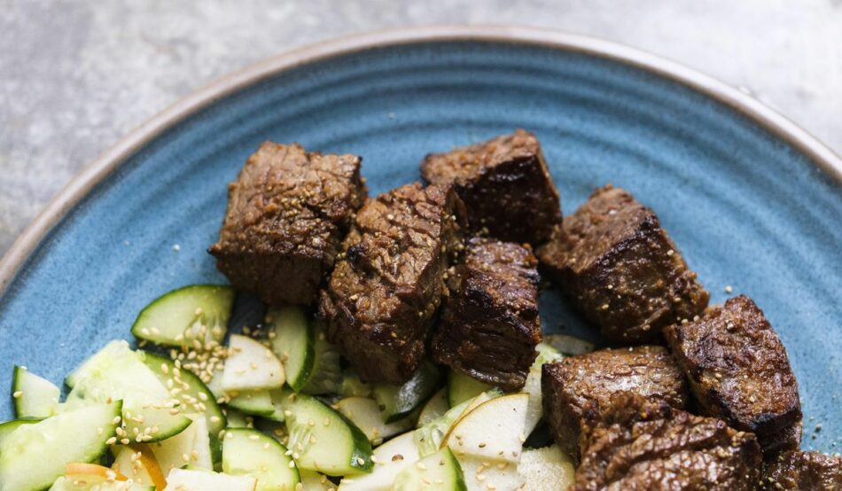 Ginger-soy steak with pear-cucumber salad: Soy marinade makes weeknight steak simple