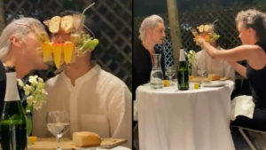Man holds cheese board in mouth at dinner table while people eat … – LADbible