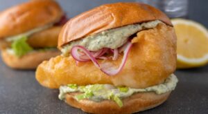 Crunchy beer-battered fish sandwich with avocado tartare sauce