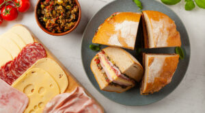 Reinvent Muffulettas With A Bruschetta Sandwich Makeover