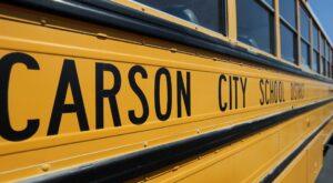 Crash involving Carson City school bus caused by driver running red light, police say