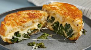 Leafy greens go decadent in this gloriously messy grilled cheese