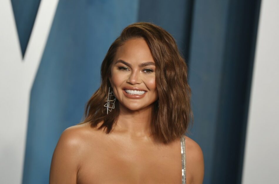 Chrissy Teigen’s Vacation Essentials Include a Suitcase Full of Legos & We Have So Many Questions – SheKnows