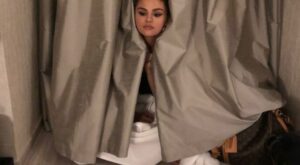Selena Gomez Hides Behind a Curtain After Wardrobe Mishap: See the Candid Photo